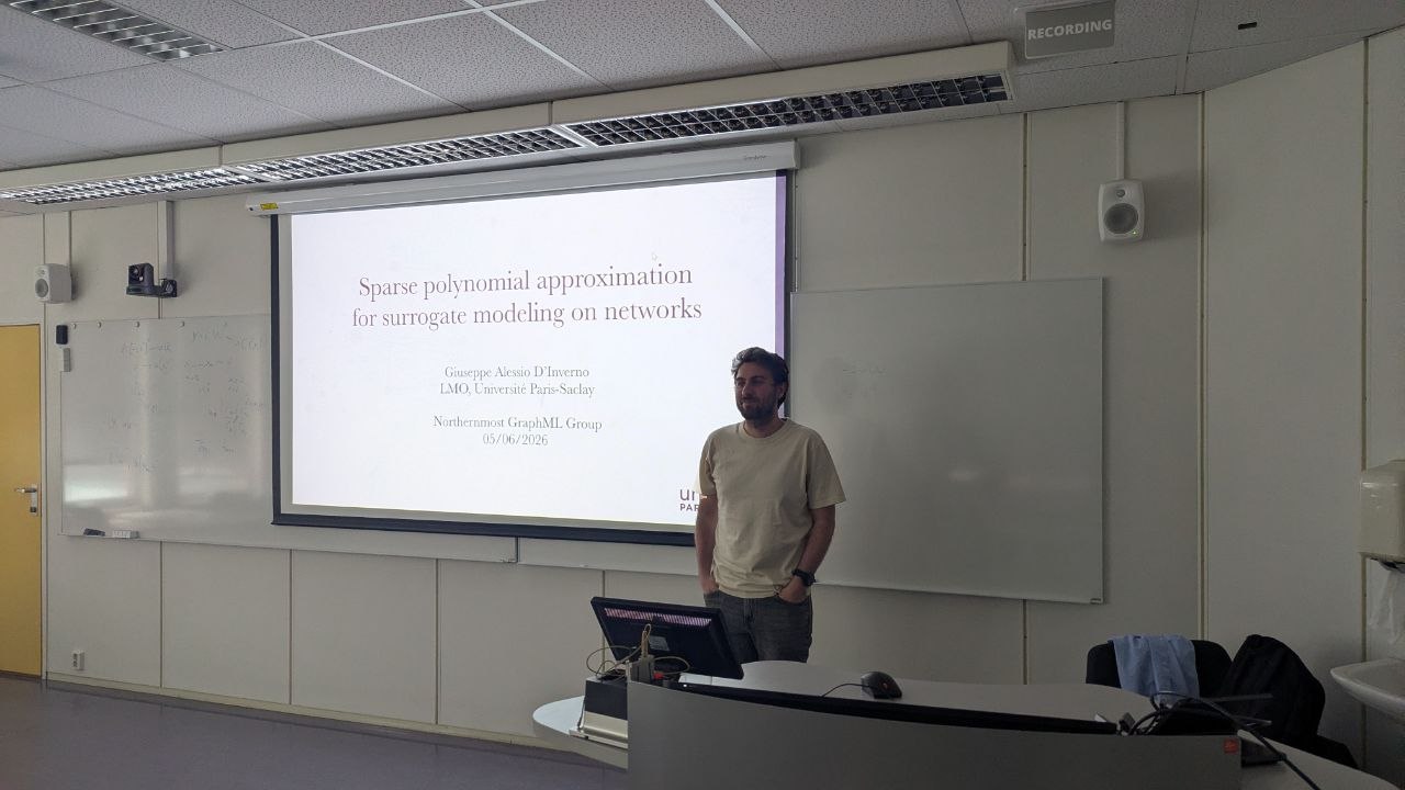 Giuseppe Alessio D'Inverno giving a seminar on Sparse Polynomial Approximation